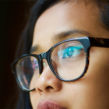 Close-up of girl wearing glasses